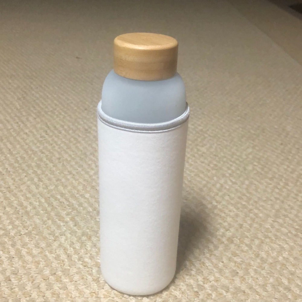 Glass bottle with koozie